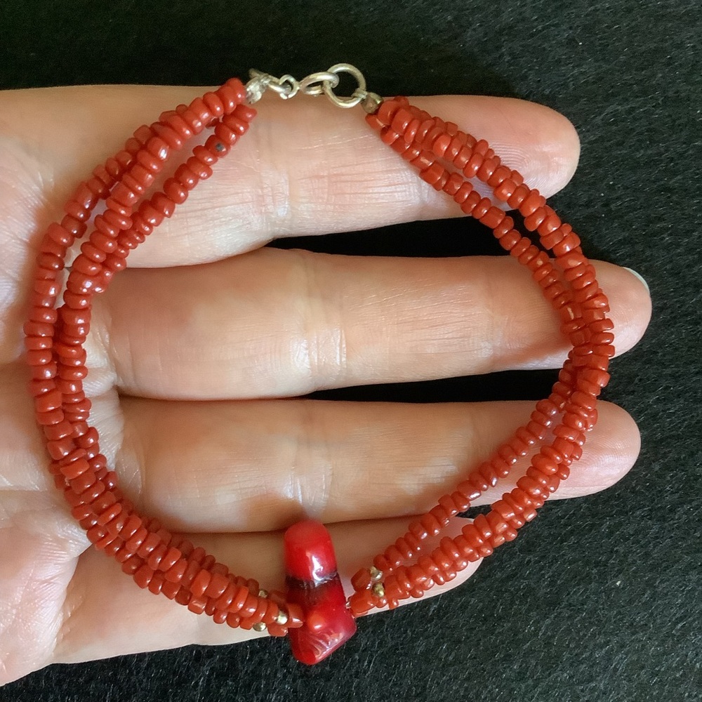Natural red coral bracelet with 925 sterling silver clasp.